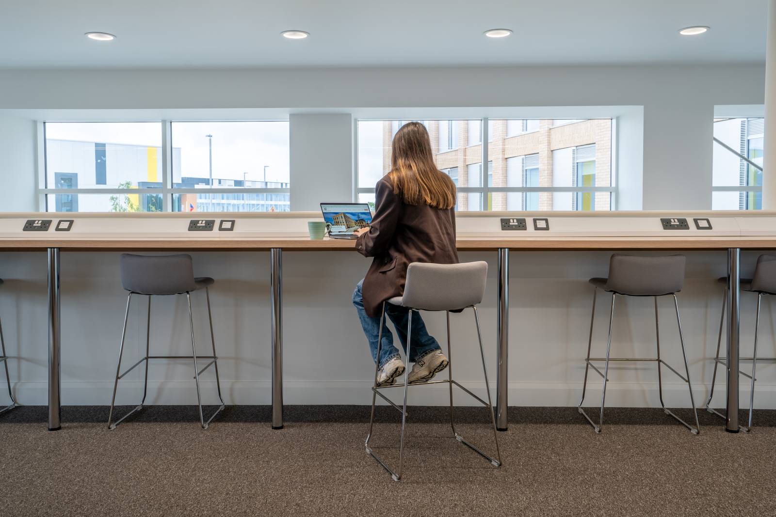 People working at hot desks