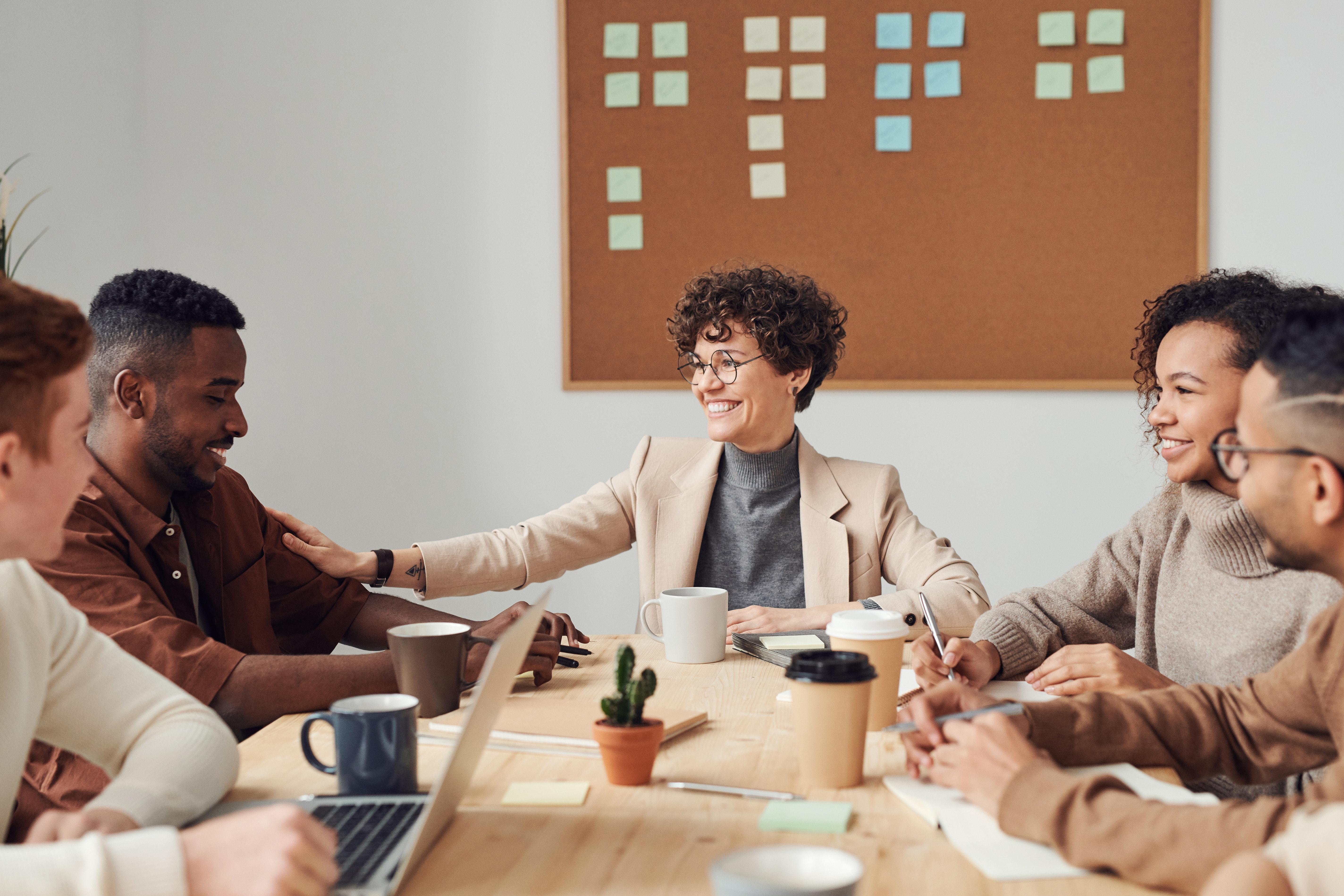 5 people working in an office