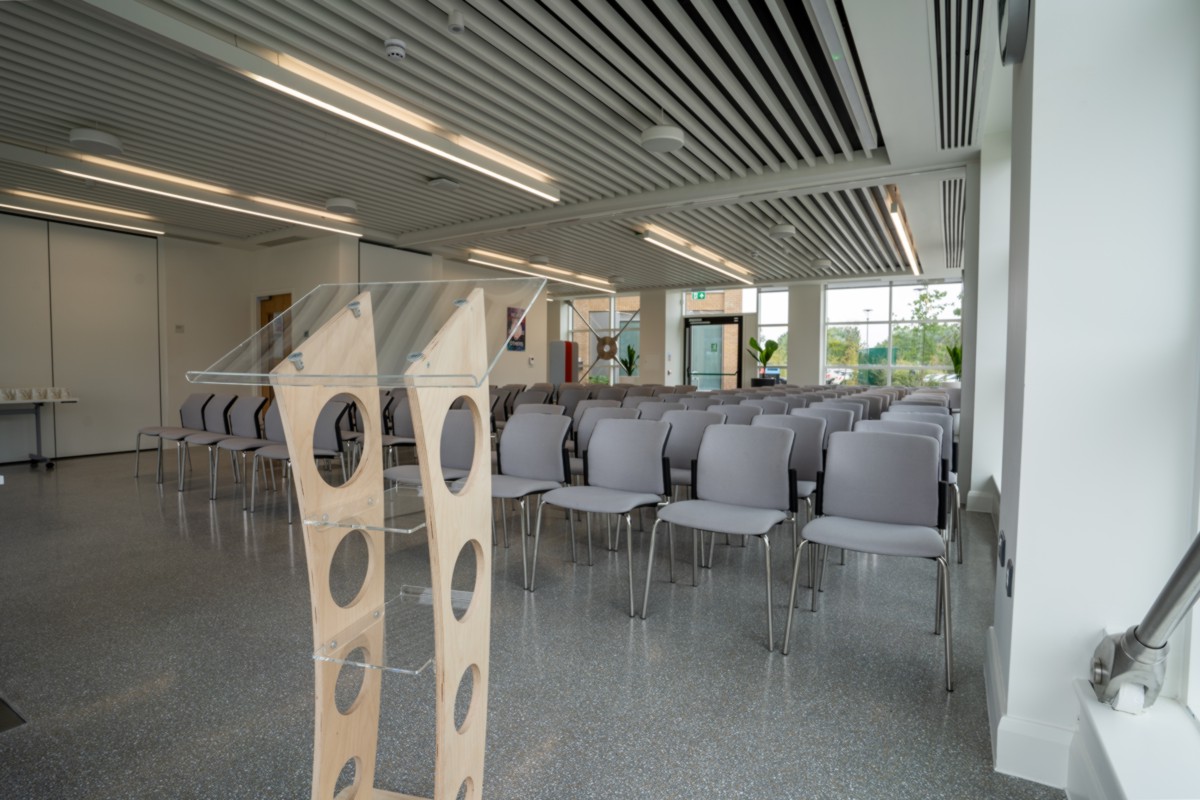 Empty conference room with a speakers stand in the Plaza