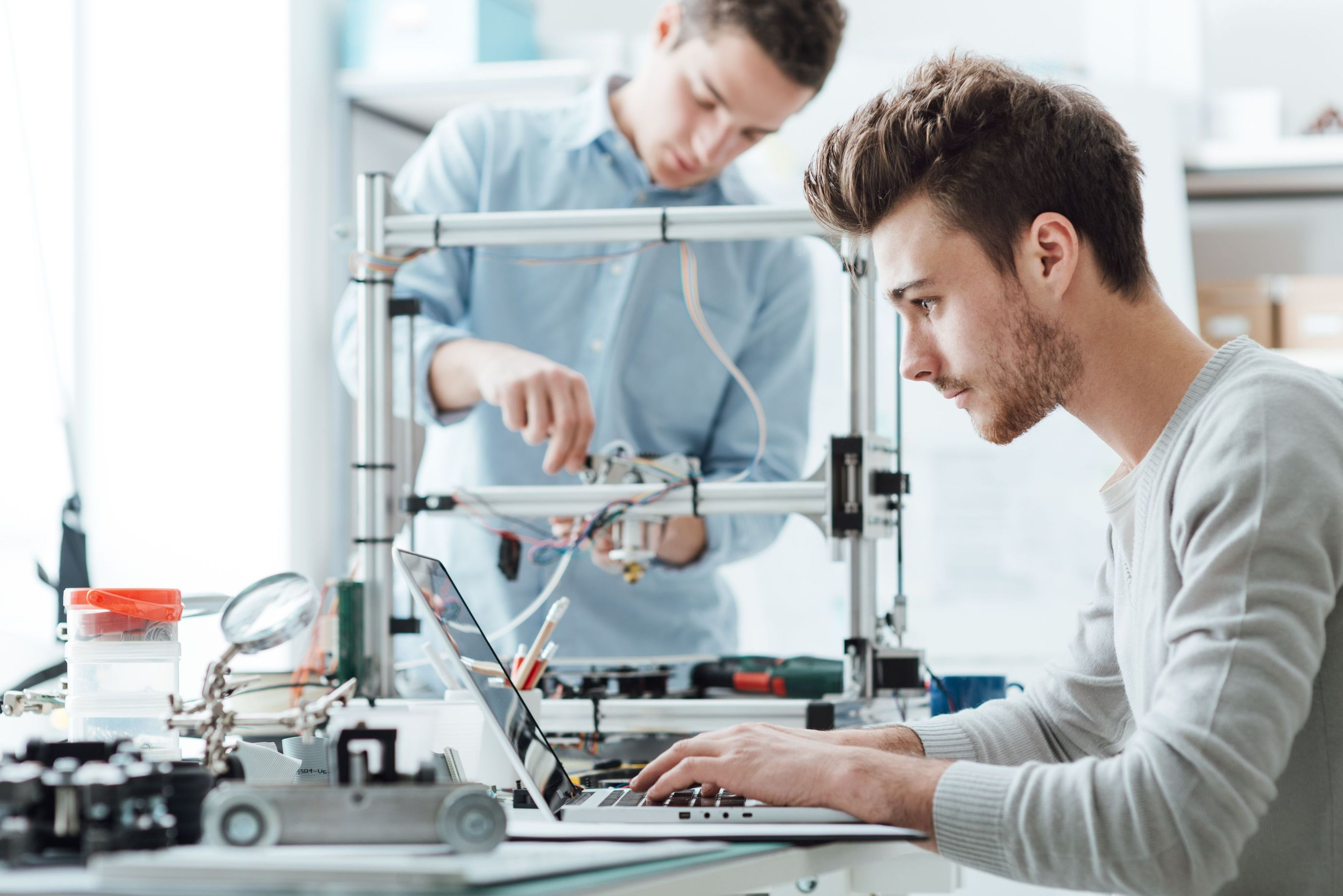 Man using a 3d printer